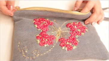 Bolso de mano (clutch) Reutilizando un jean/Bordado a mano con cintas o listón